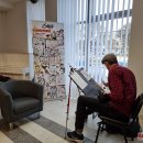 Pro bibliotekos langus žvelgia E. Raugo peizažai (foto)