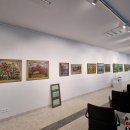 Pro bibliotekos langus žvelgia E. Raugo peizažai (foto)