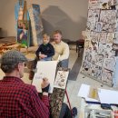 Pro bibliotekos langus žvelgia E. Raugo peizažai (foto)