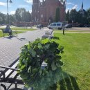 Keliautojas jau namuose: D. Mikalkėnui užkabintas ąžuolo vainikas ir iškeptas kelio formos tortas (foto+video)